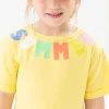 Maglietta a maglia per neonata in giallo