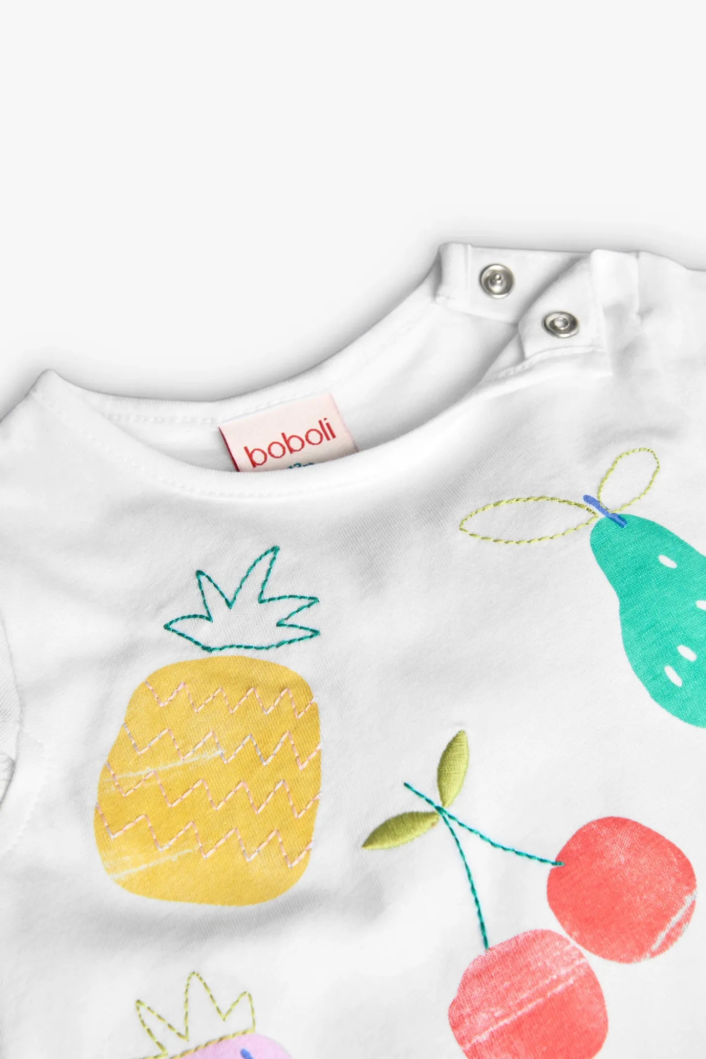 Maglietta a maglia per neonata in colore bianco con stampa di frutti