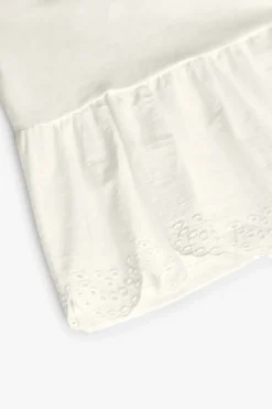 Maglietta a maglia per neonata in colore bianco combinato