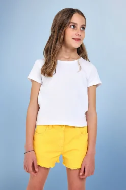 Maglietta di base in maglia per bambina di colore bianco.