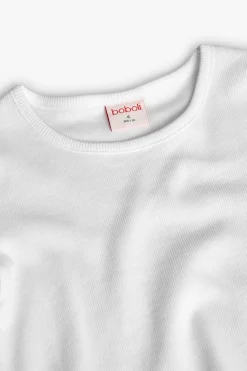 Maglietta di base in maglia per bambina di colore bianco.