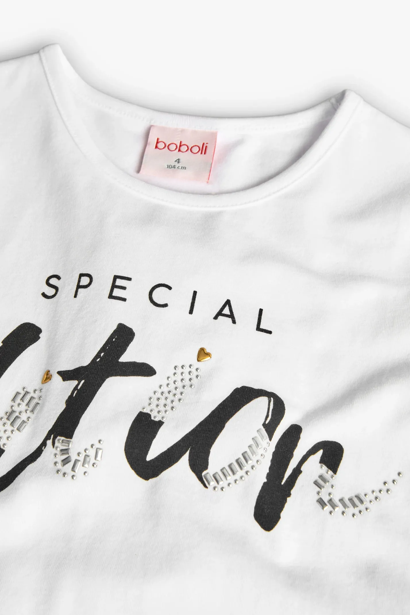 Maglietta di maglia elastica per bambina di colore bianco