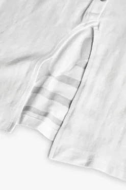 Maglietta di maglia per bambina di colore bianco con stampa di bambina.