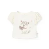 Maglietta di maglia per neonata in colore bianco.