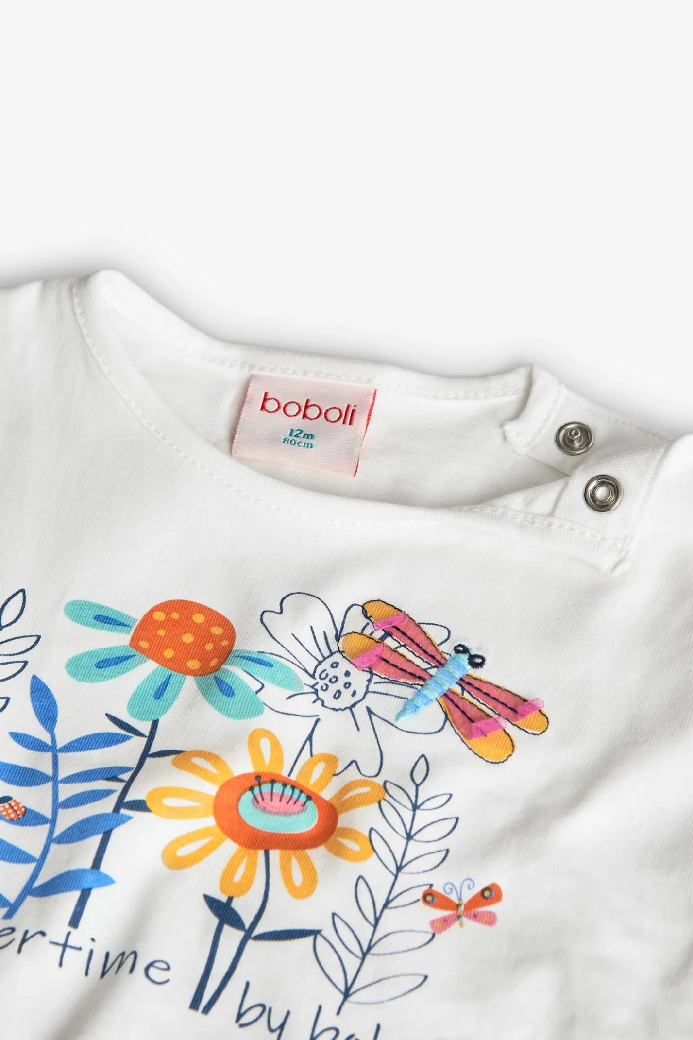Maglietta di maglia per neonata in bianco