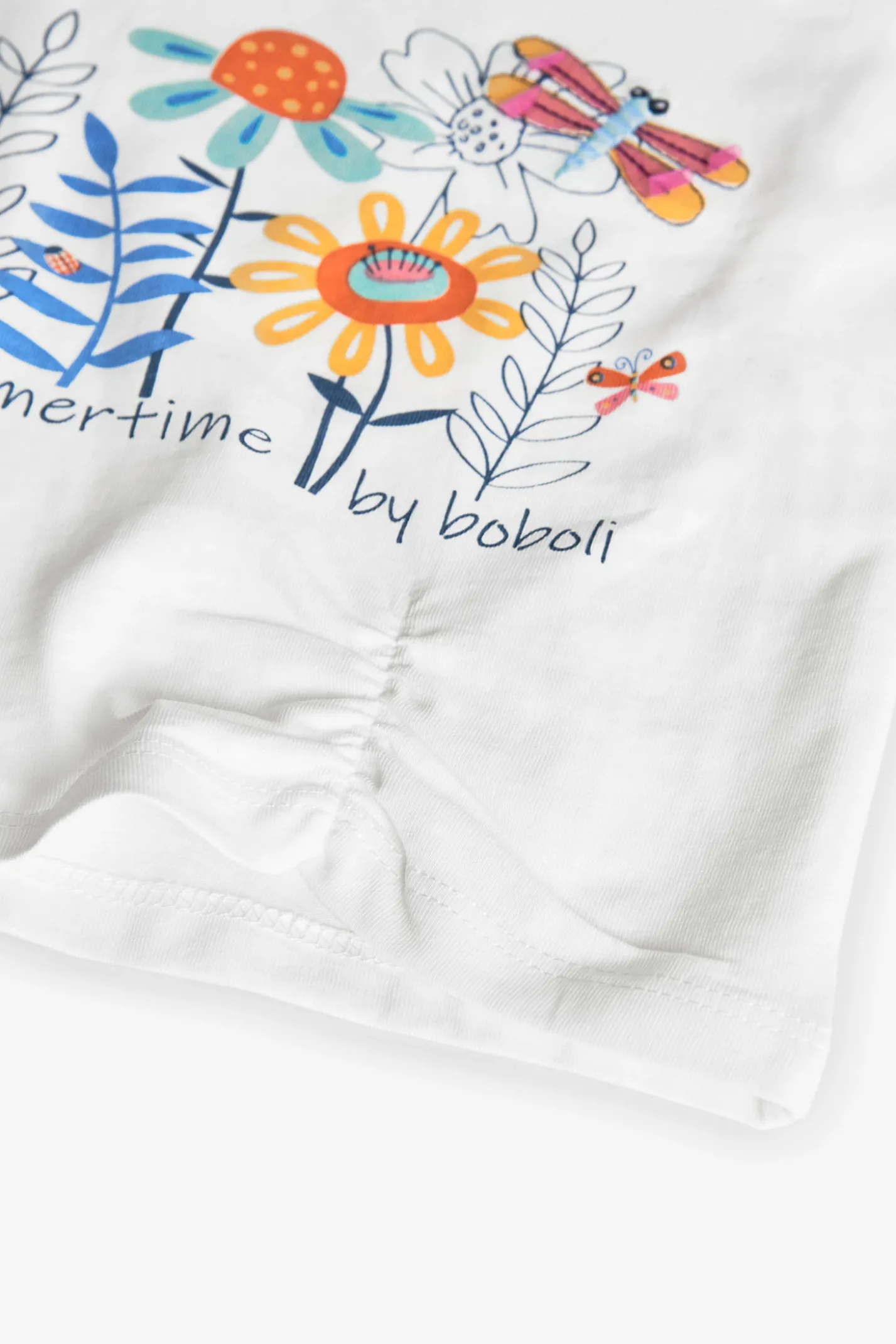 Maglietta di maglia per neonata in bianco