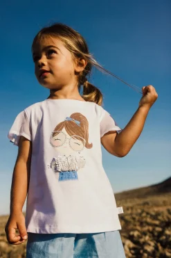 Maglietta in maglia elastica per bambina di colore bianco