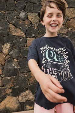 Maglietta in maglia per bambina di colore grigio.