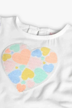 Maglietta in maglia per bambina in colore bianco con stampa a cuore.