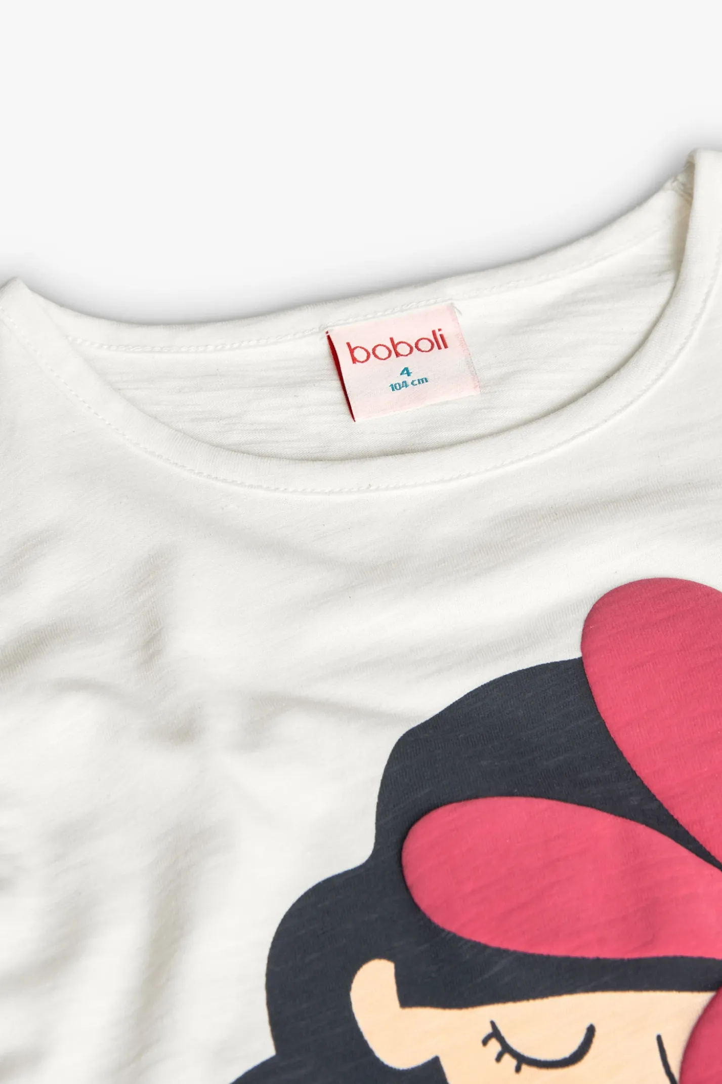 Maglietta in maglia per bambina a maniche lunghe di colore bianco.