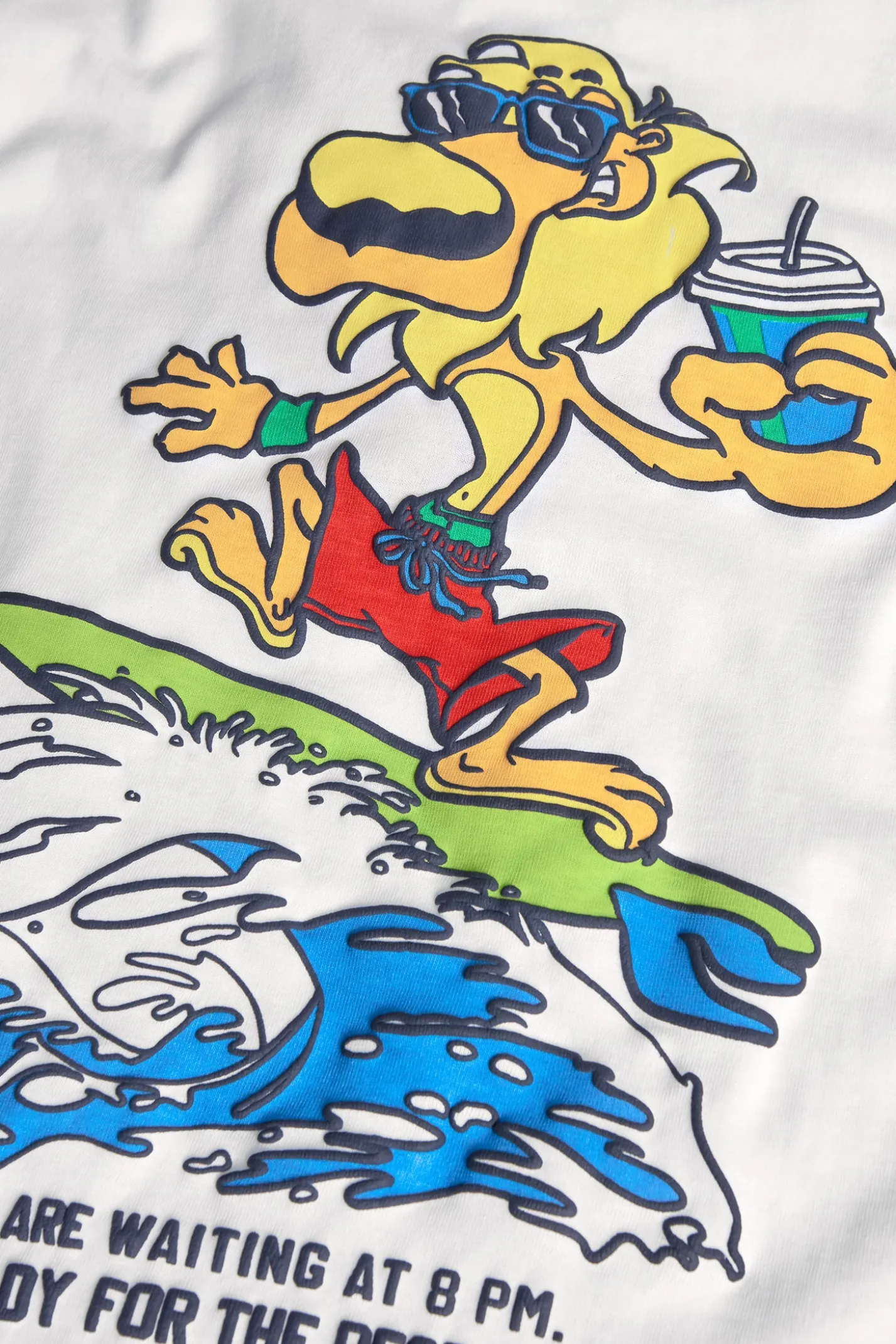 Maglietta in maglia per bambino bianca con design di leone surfista