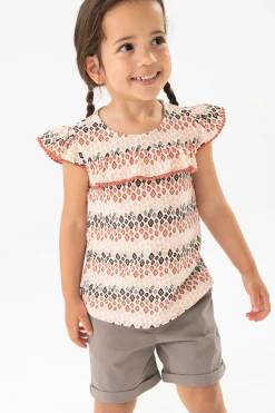Maglietta in maglia per neonata in colore pastello con stampa
