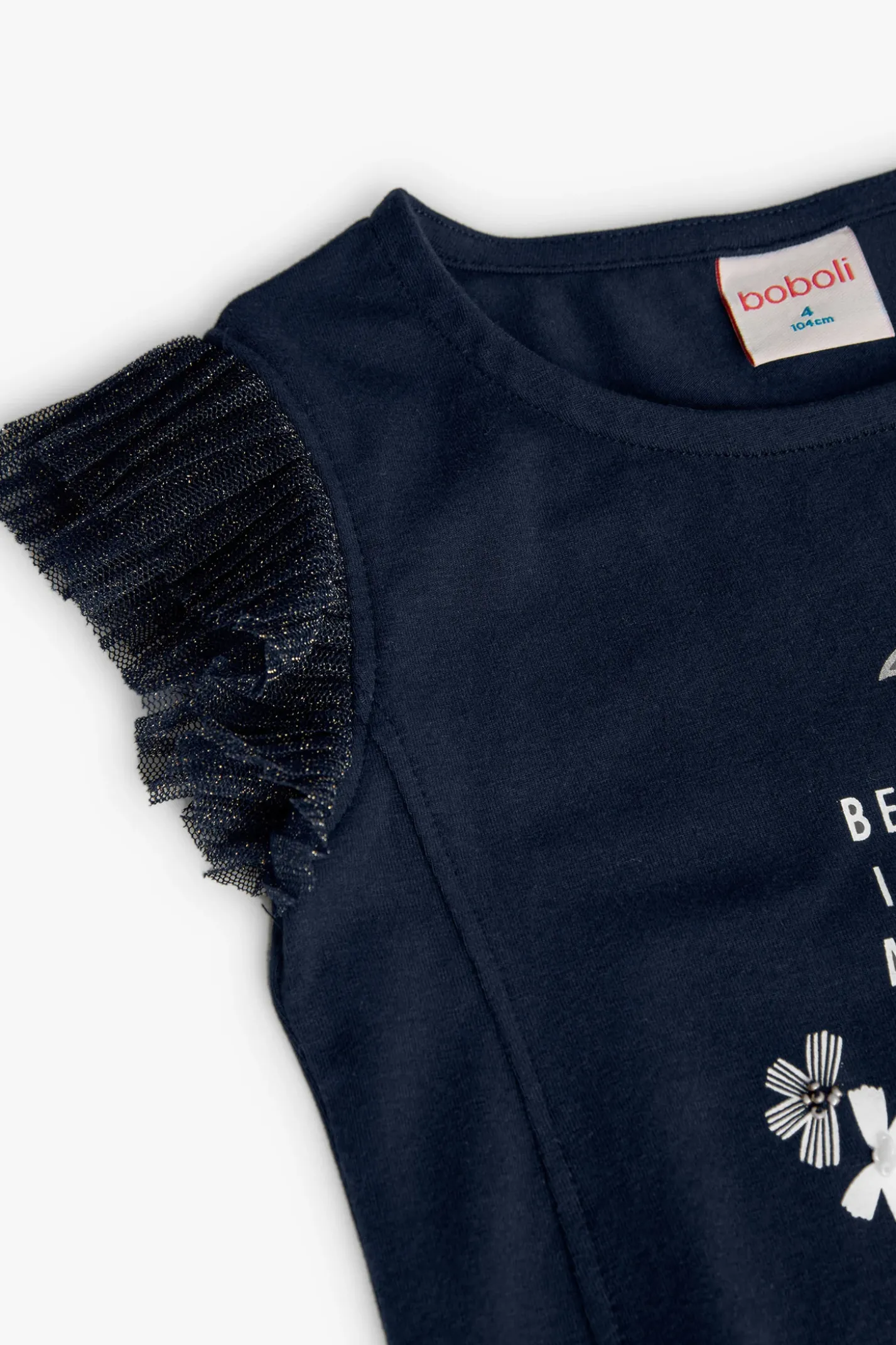 Maglietta lavorata a maglia per bambina con stampa floreale in colore blu navy.