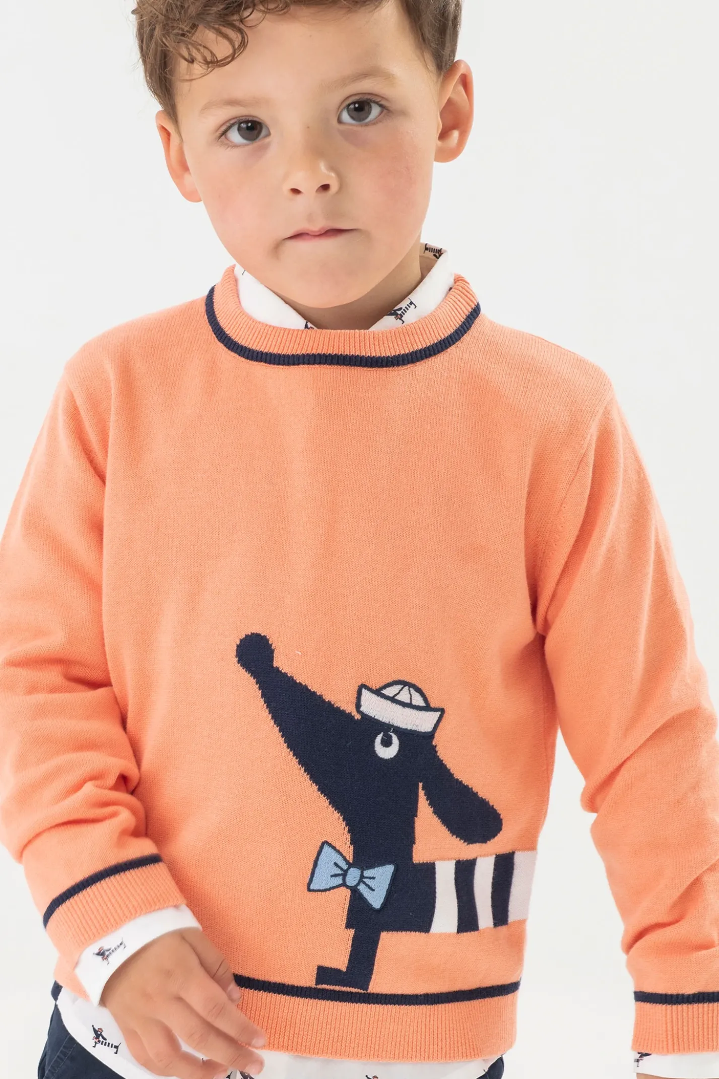 Maglione tricotoso per neonato di colore arancione