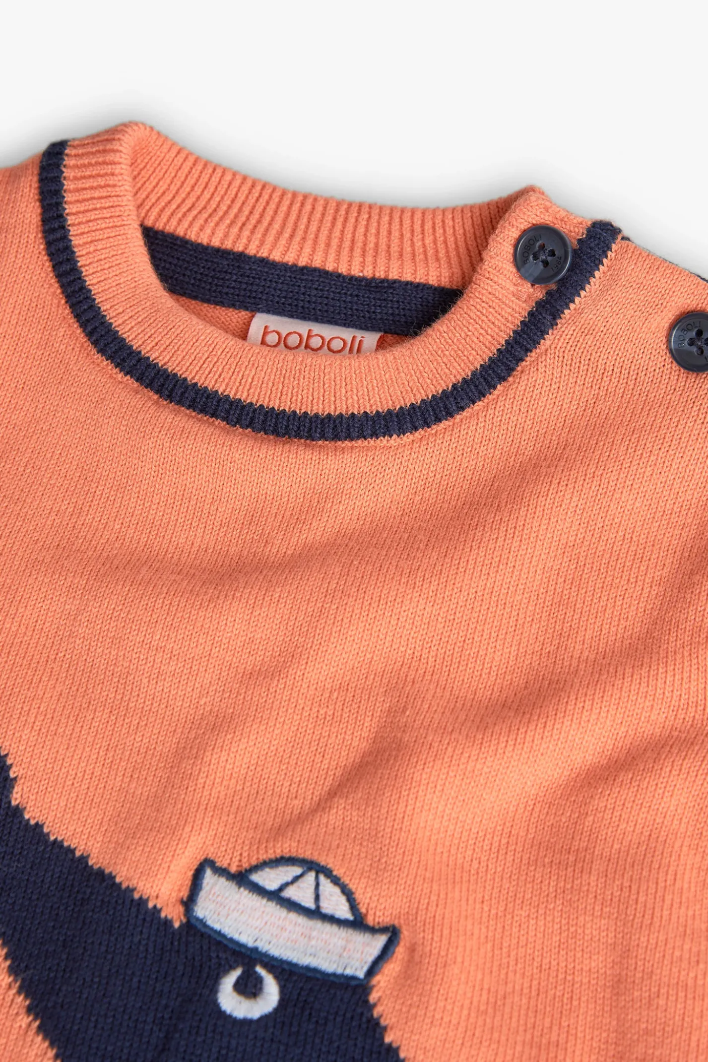 Maglione tricotoso per neonato di colore arancione