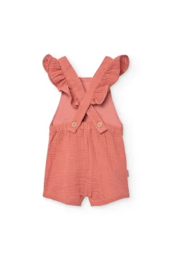 Pagliaccetto a maglia per bambina in colore arancione.