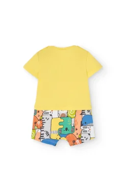 Pagliaccetto corto a maglia per neonato di colore giallo.