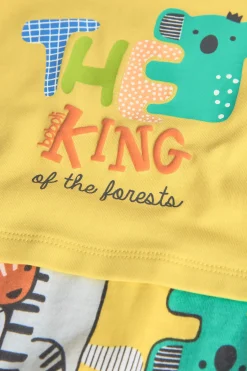 Pagliaccetto corto a maglia per neonato di colore giallo.
