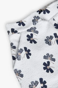 Pantaloncini in maglia per bambina con stampa floreale in bianco e blu