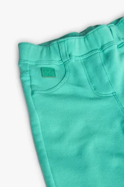 Pantalone base in maglia per bambina in colore verde