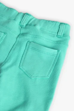 Pantalone base in maglia per bambina in colore verde