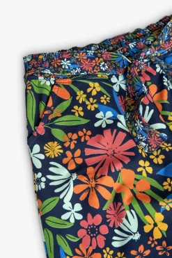 Pantalone in maglia elastica per bambina con stampa floreale