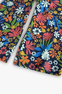 Pantalone in maglia elastica per bambina con stampa floreale