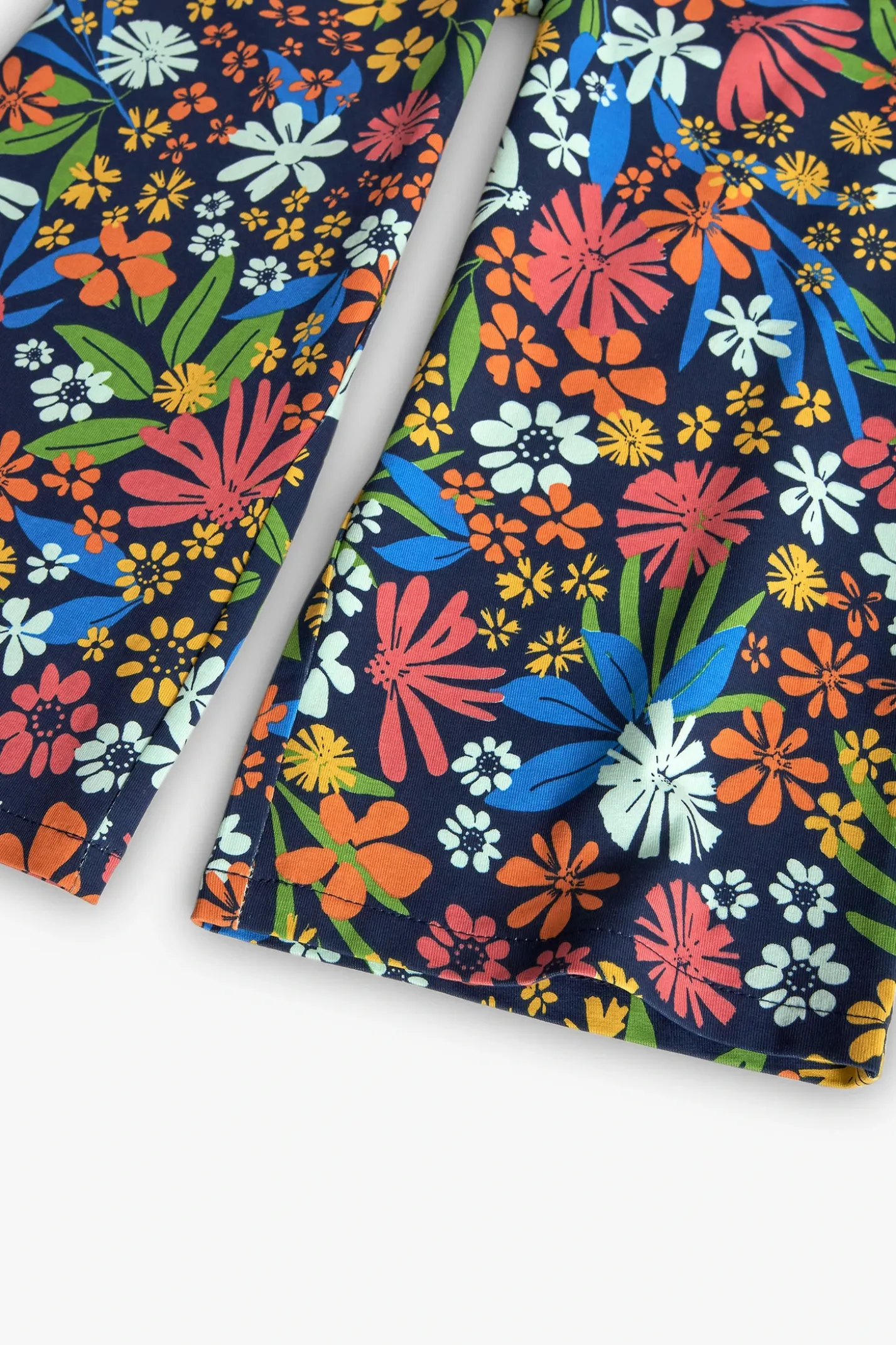 Pantalone in maglia elastica per bambina con stampa floreale