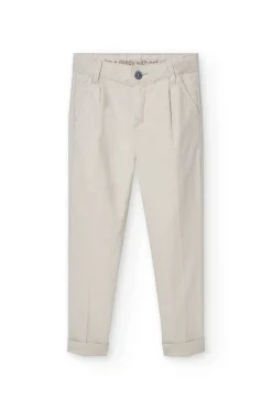 Pantaloni di lino per bambino in colore beige.