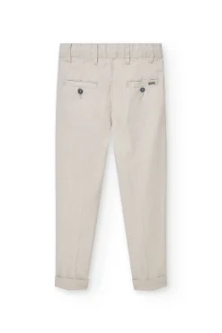 Pantaloni di lino per bambino in colore beige.
