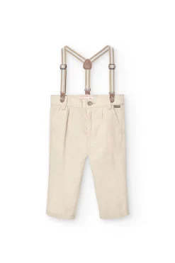 Pantaloni in lino per bambino in beige con bretelle.