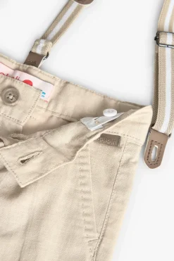 Pantaloni in lino per bambino in beige con bretelle.