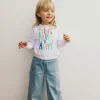 Pantaloni in maglia per bambina in colore bleach.