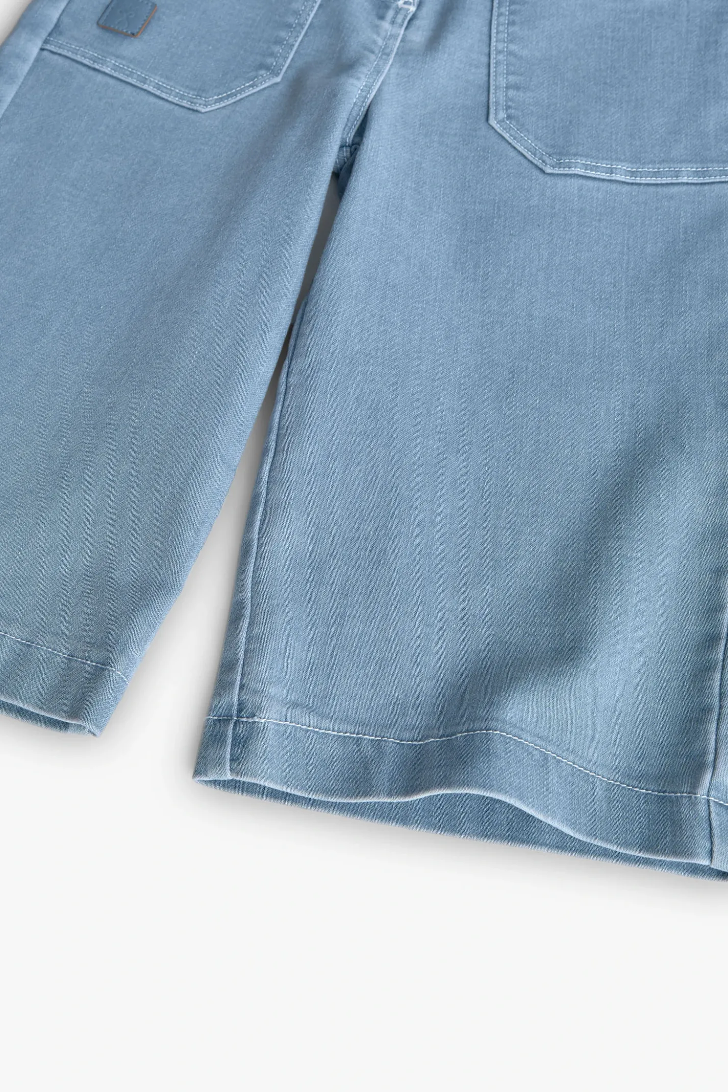 Pantaloni in maglia per bambina in colore bleach.