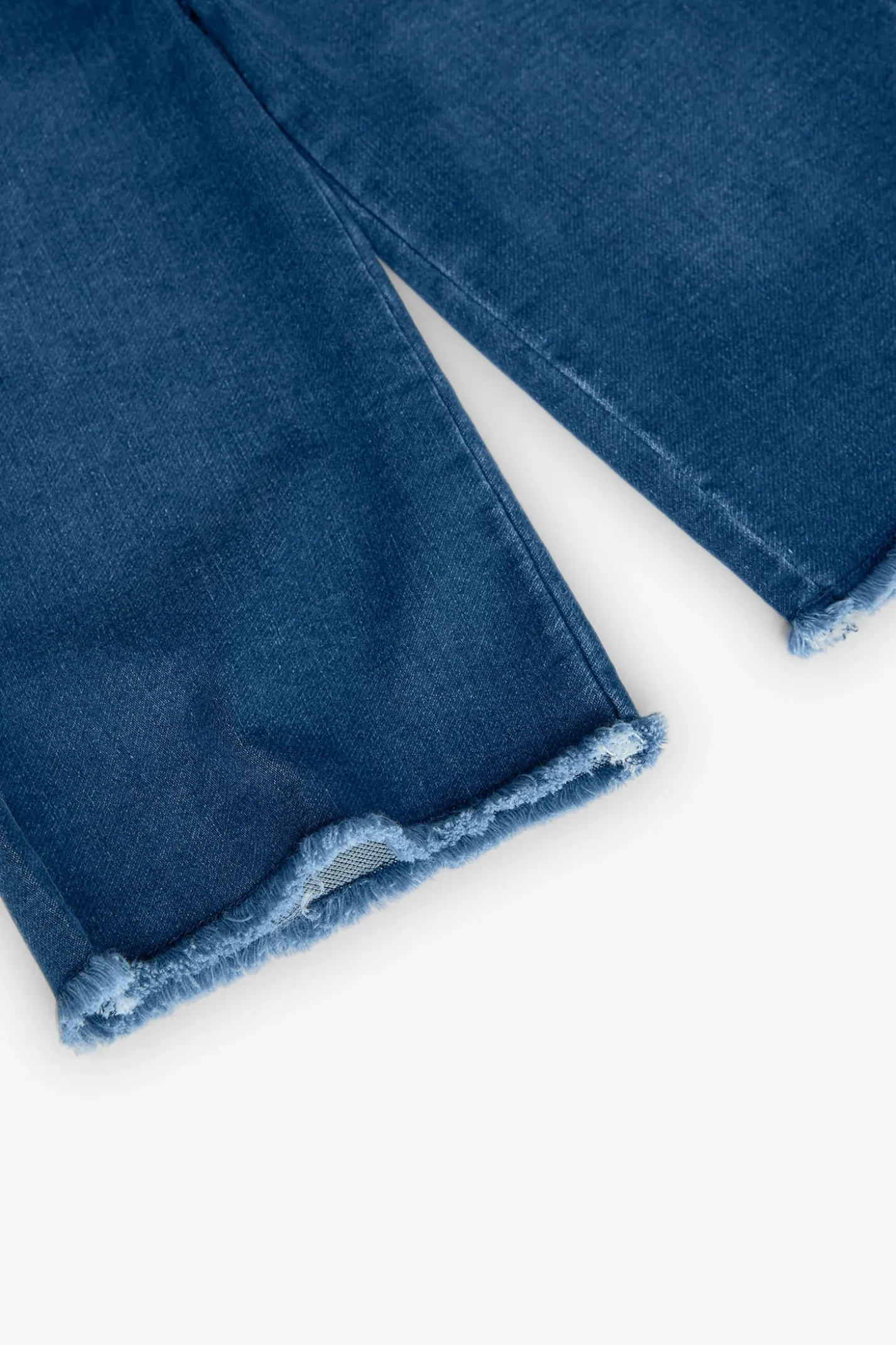Pantaloni in maglia per neonata in colore blu con ricamo