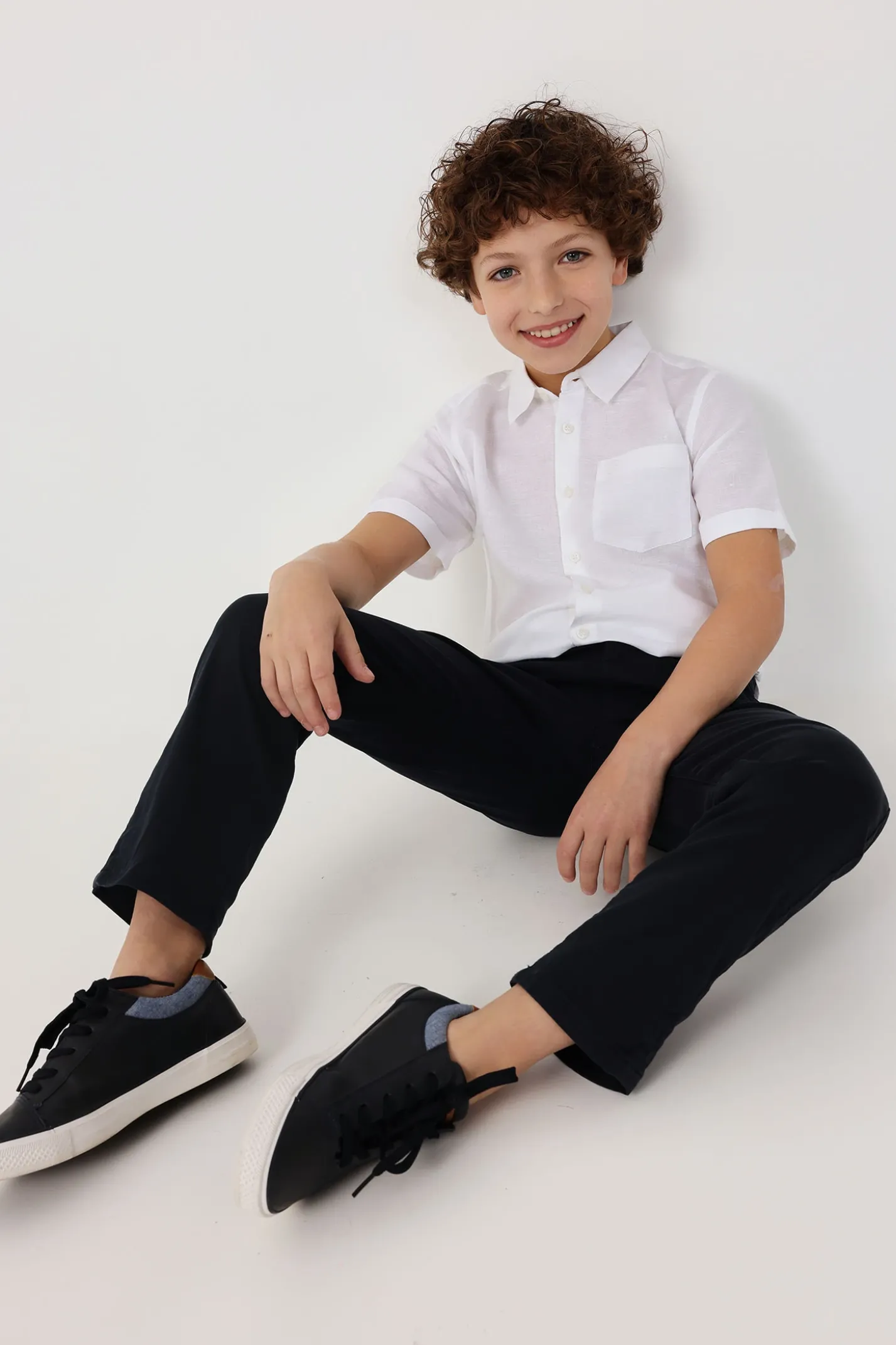 Pantaloni in raso per bambino di colore blu navy