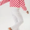 Pantaloni svasati da bambina di colore bianco