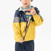 Parka reversibile per neonato in colore senape e nero con stampa