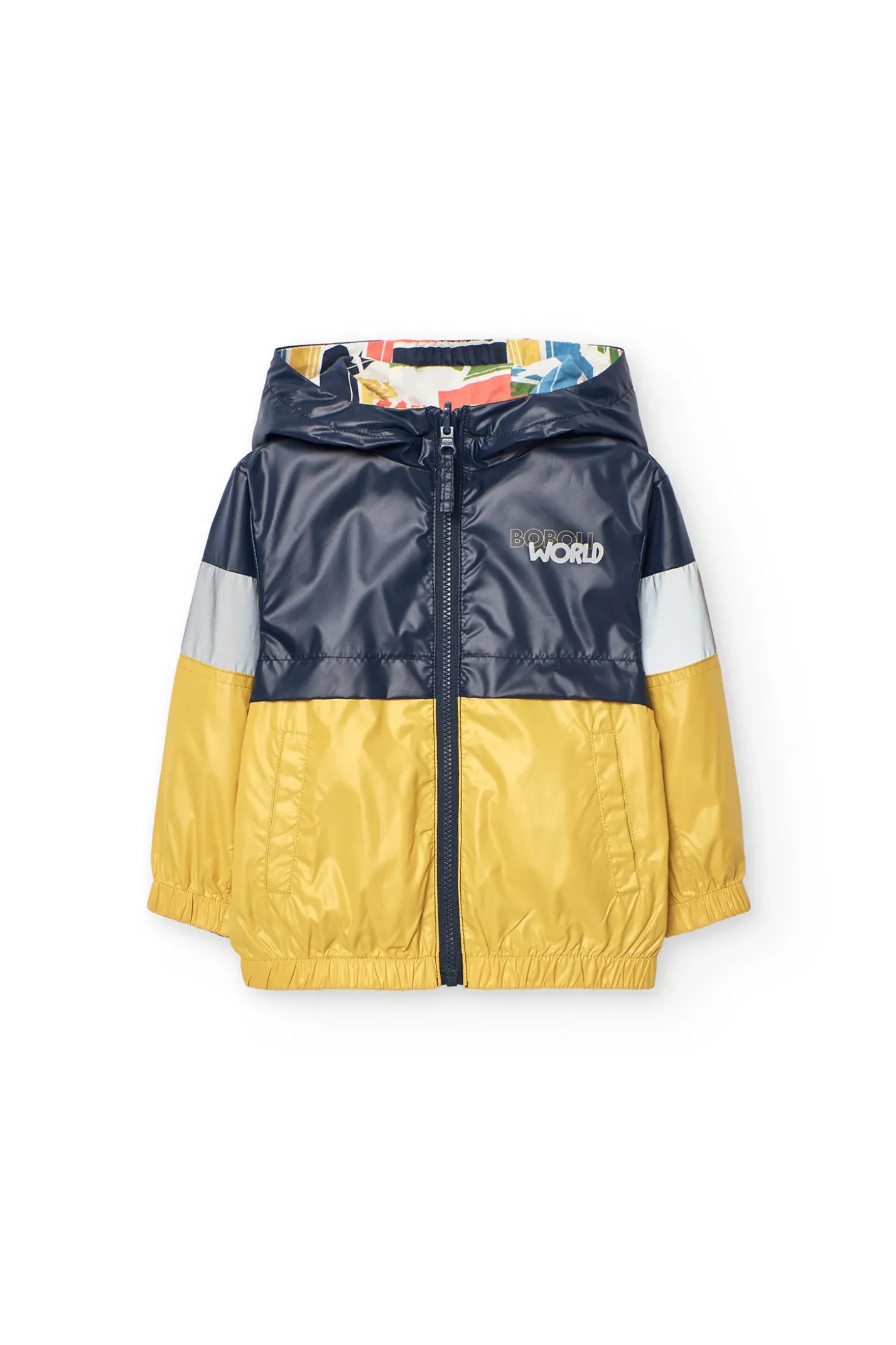 Parka reversibile per neonato in colore senape e nero con stampa