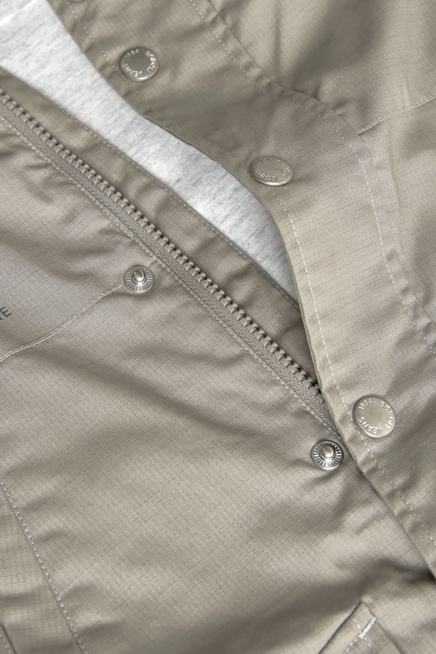Parka tecnica a maglia per bambino di colore marrone