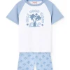Pigiama corto in maglia per bambino con stampa in colore blu.