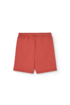 Pigiama corto in maglia per bambino di colore arancione