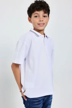 Polo in piqué da bambino colore bianco