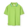 Polo in piqué per bambino di colore verde.