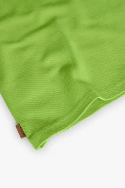 Polo in piqué per bambino di colore verde.