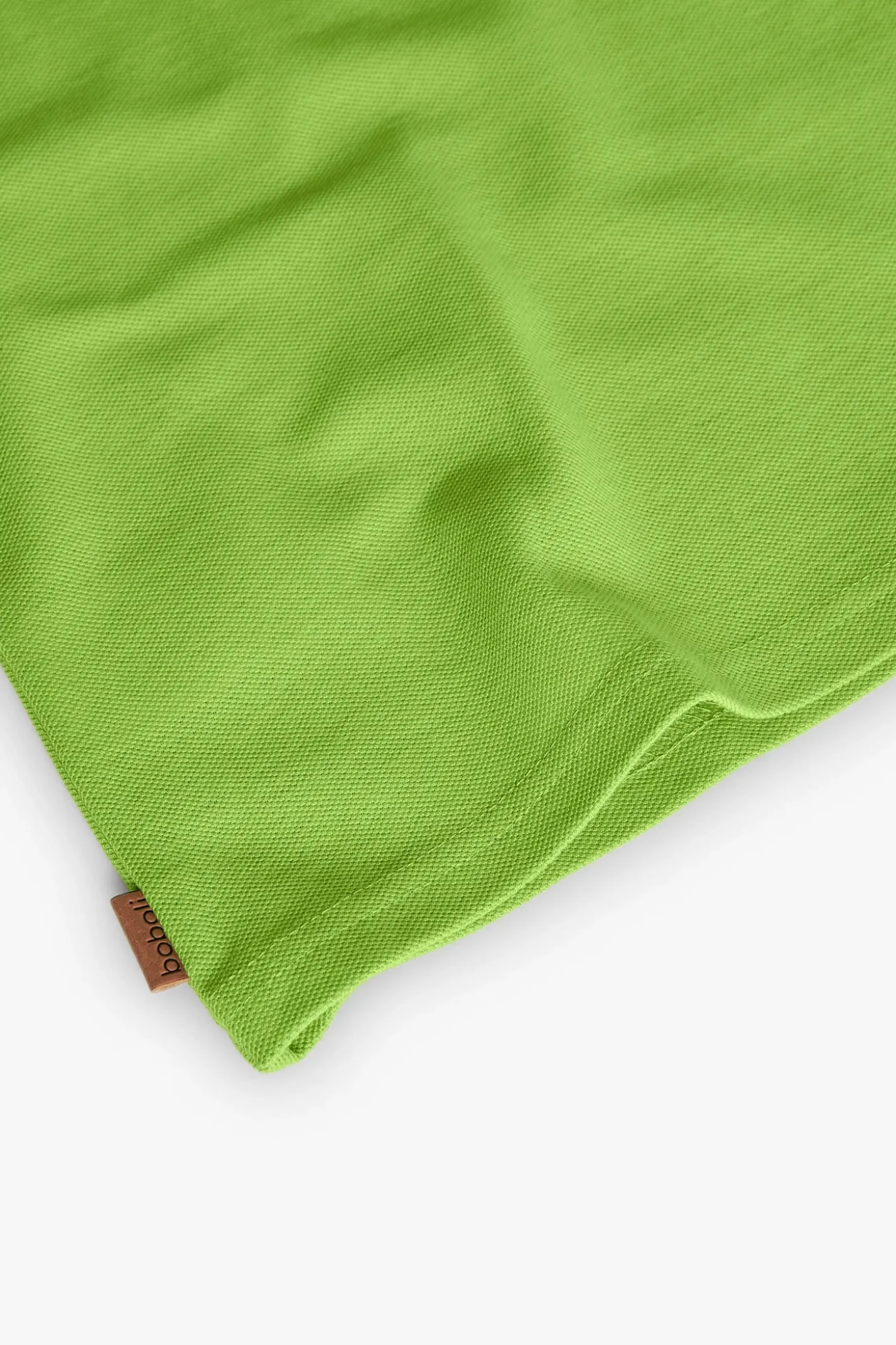 Polo in piqué per bambino di colore verde.