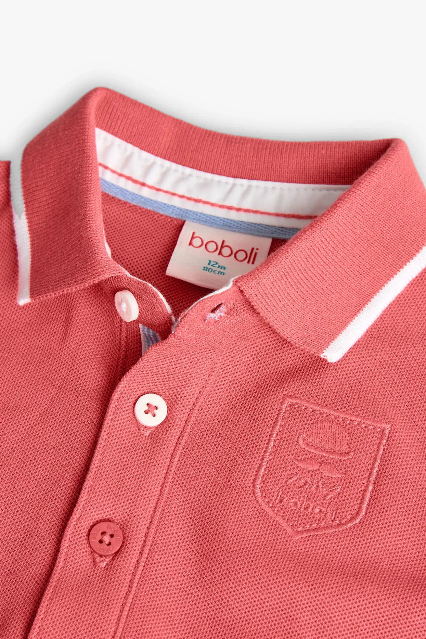 Polo in piqué per neonato di colore rosso