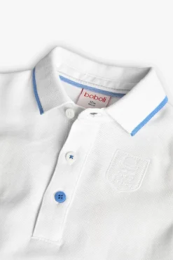 Polo piqué per bambino in colore bianco.