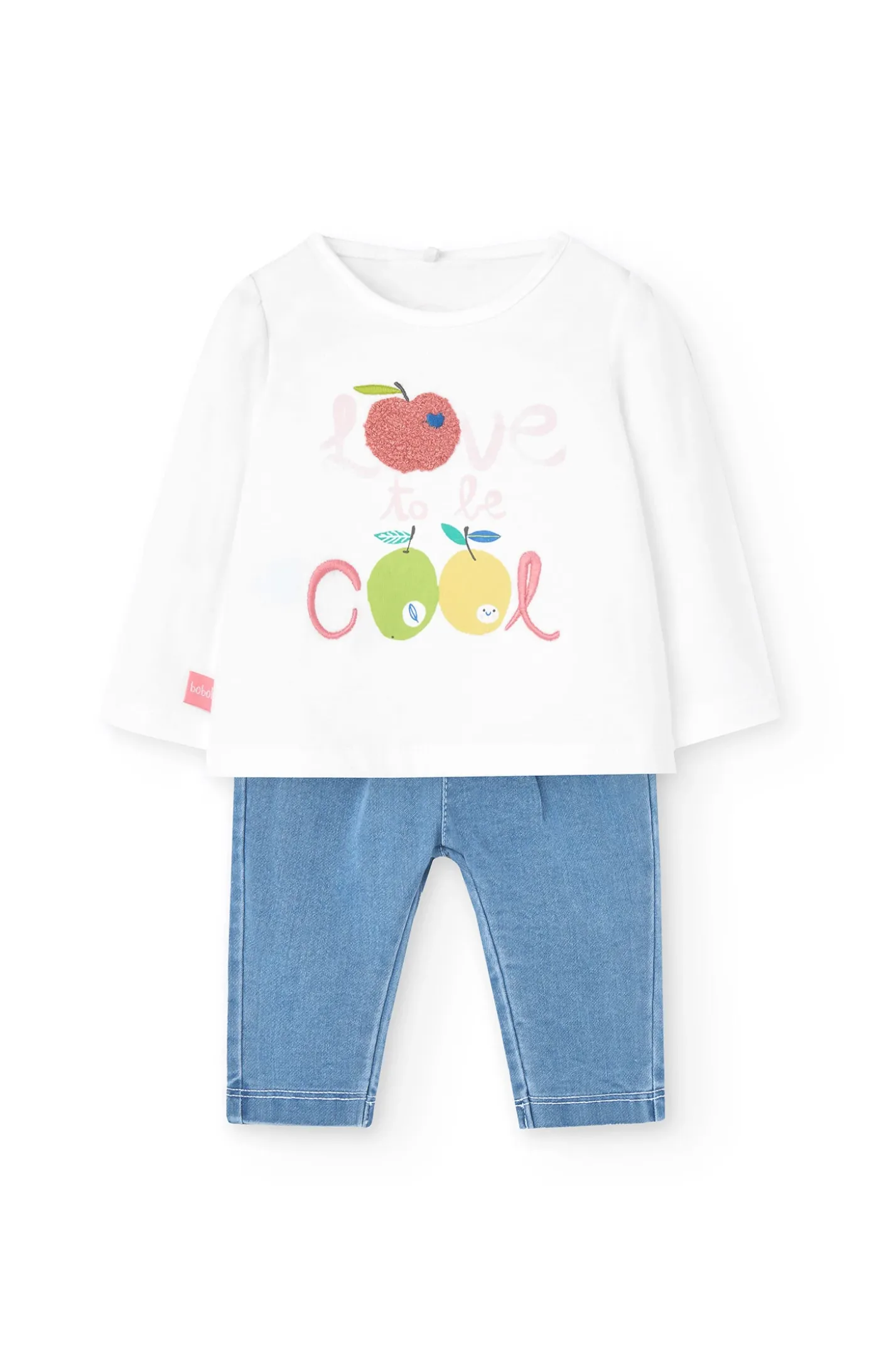 Set coordinato con maglietta e pantaloni in maglia per bambina in colore bianco.