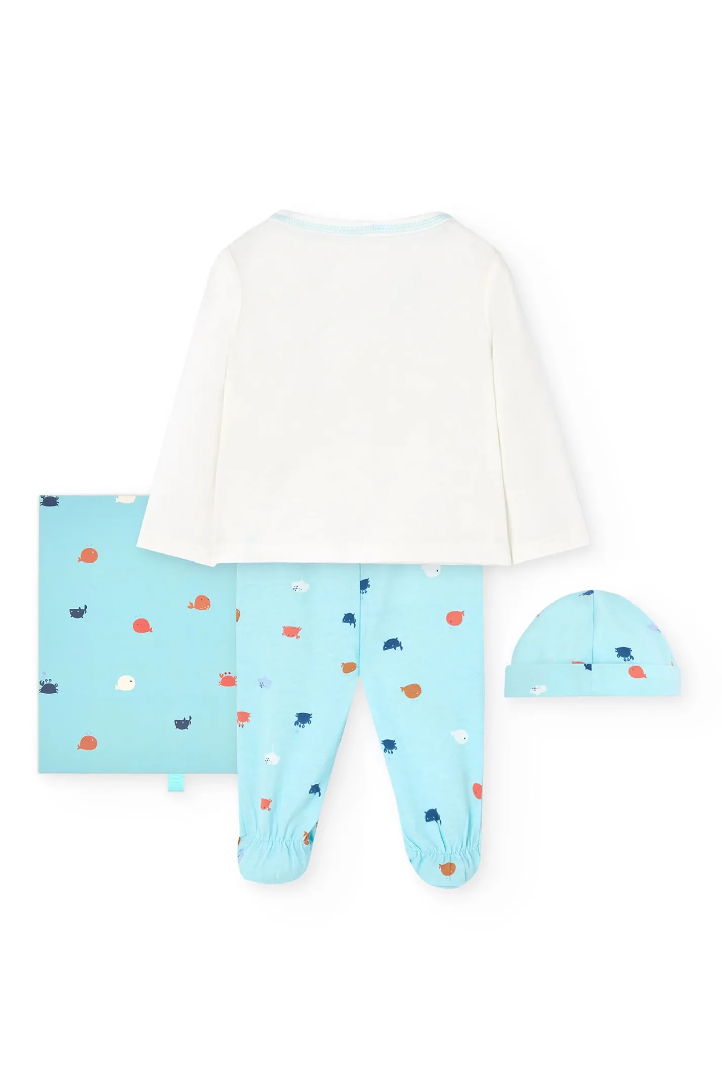 Set di maglieria per neonato in colore bianco.